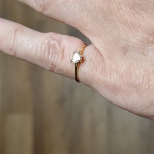 14k gold solitaire heart shaped diamond ring. .5 carat (5.0 mm) size 4